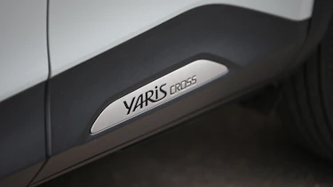 Toyota Yaris Cross - lower-door nameplate