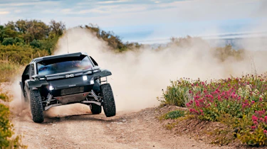 Dacia Sandrider - cornering with dust trail