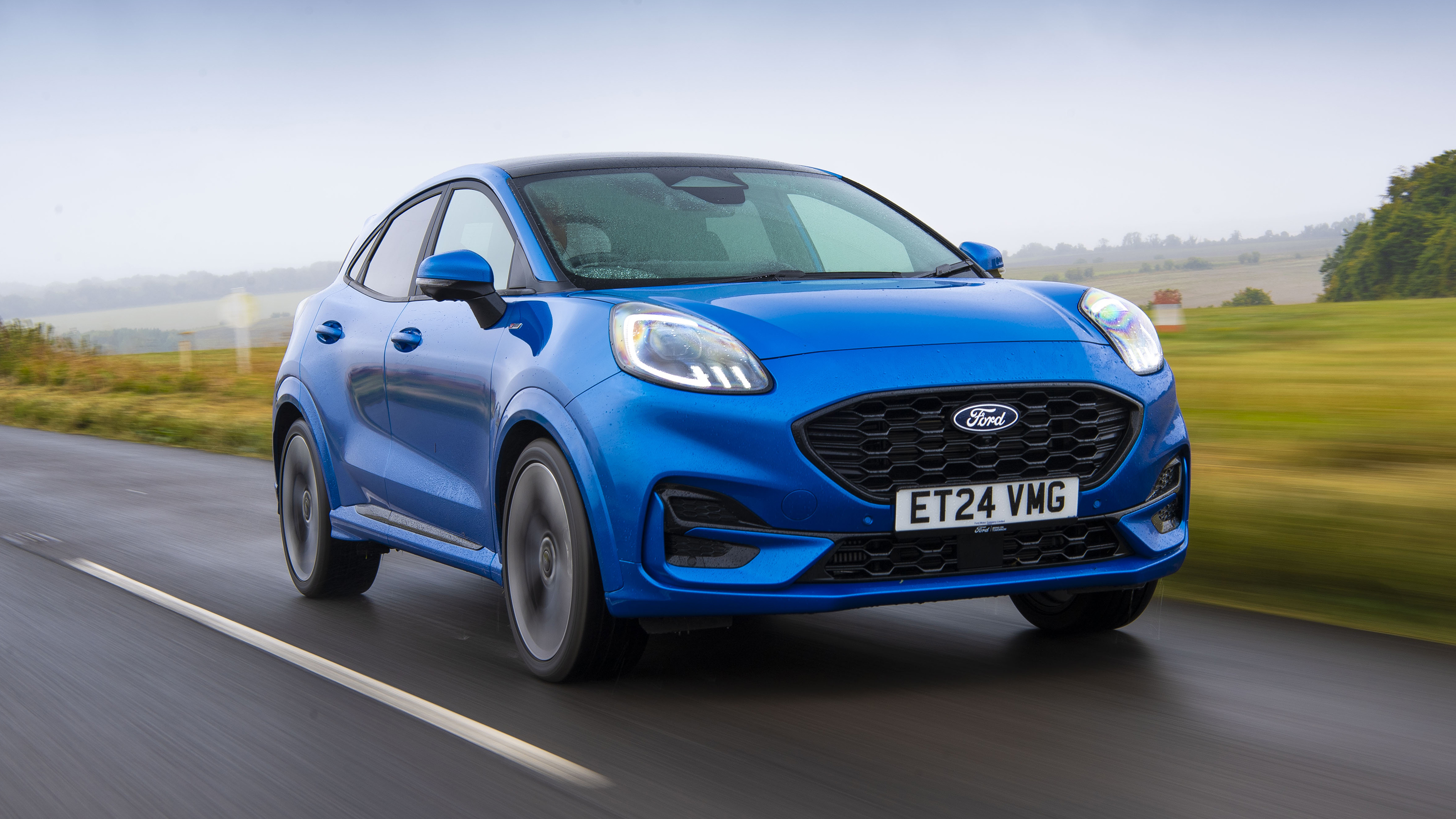 Facelifted Ford Puma being driven in the UK - front tracking 