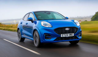 Facelifted Ford Puma being driven in the UK - front tracking