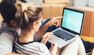 People browsing on a laptop
