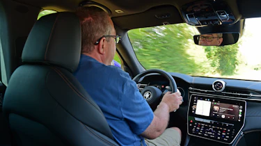 John McIlroy driving the Maserati Grecale Folgore