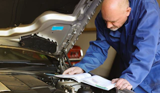 Mechanic working on a car