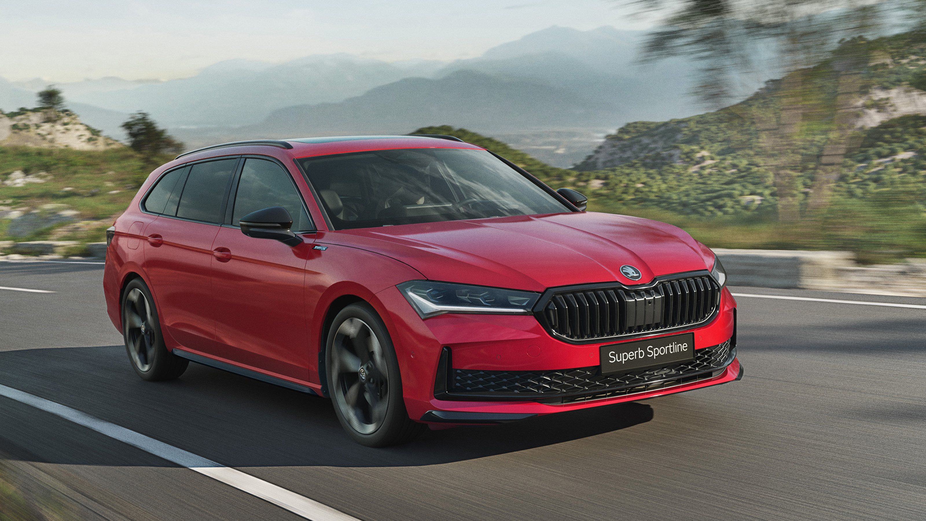 New Skoda Superb SportLine Estate - front tracking 