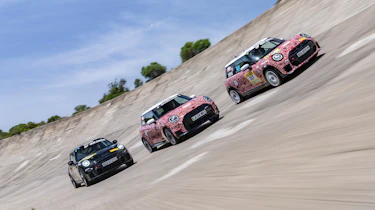 MINI Cooper JCW models on banked circuit - front tracking