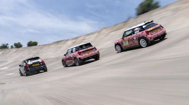 MINI Cooper JCW models on banked circuit - rear tracking