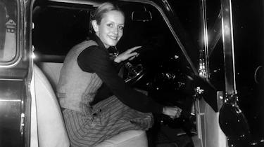 Super Mini Coopers - Twiggy sat in a Rover Mini 30