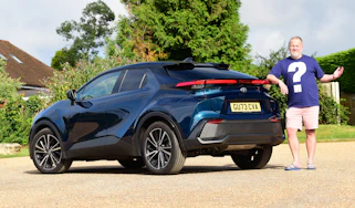 Auto Express commercial editor Paul Adam standing behind the Toyota C-HR
