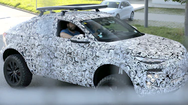 Audi Q6 e-tron Dakar (camouflaged) - side action