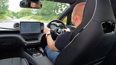 Alex Ingram driving the BYD Dolphin Active