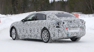 Electric Mercedes C-Class (camouflaged test car) - rear 3/4