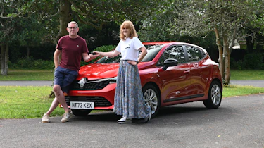 Auto Express pictures editor Dawn Grant and her husband Dave standing next to the Renault Clio