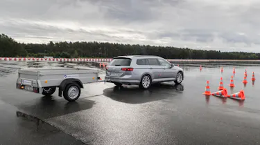 Volkswagen Trailer Assist being demonstrated on a test track with a Volkswagen Passat