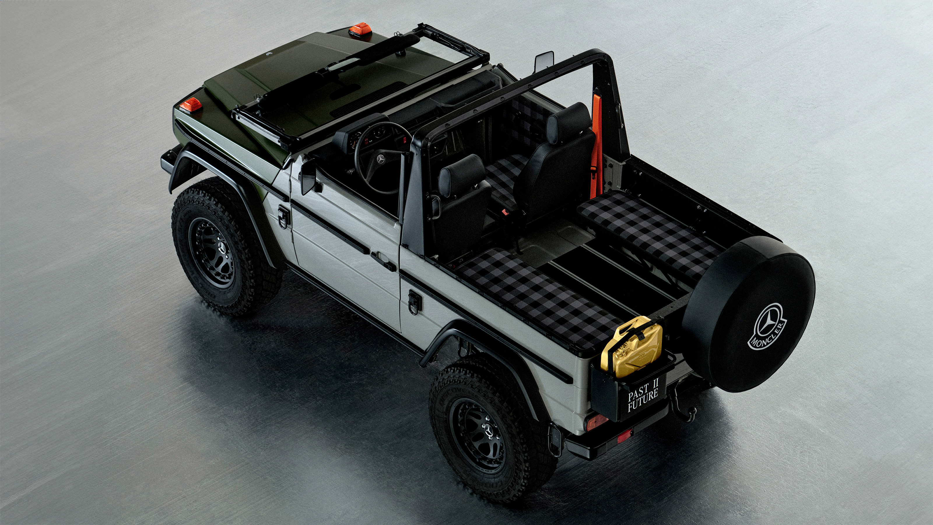 Mercedes G-Class Past II Future - rear 3/4 open roof and windscreen down