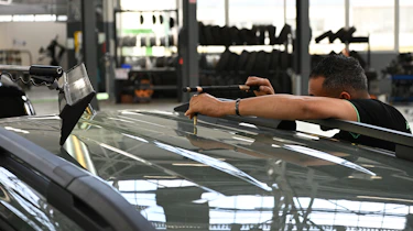 Renault ReFactory - technician working on car roof