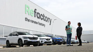 Auto Express consumer reporter Tom Jervis standing outside the Renault ReFactory facility