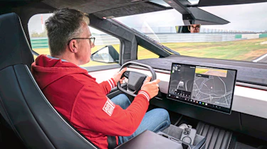 Auto Express contributor Robin Hornig driving the Tesla Cybertruck Cyberbeast