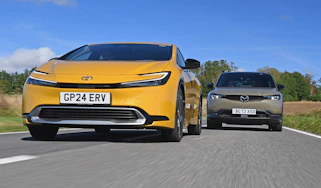 Toyota Prius PHEV and Mazda MX-30 R-EV - front tracking
