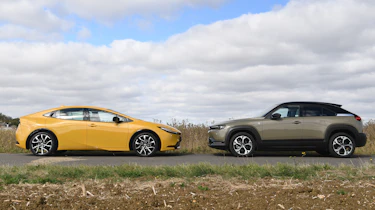 Toyota Prius PHEV and Mazda MX-30 R-EV - side shot