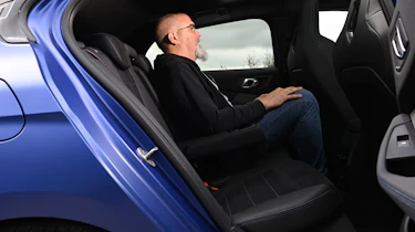 Dean Gibson sat in the BMW M135 xDrive