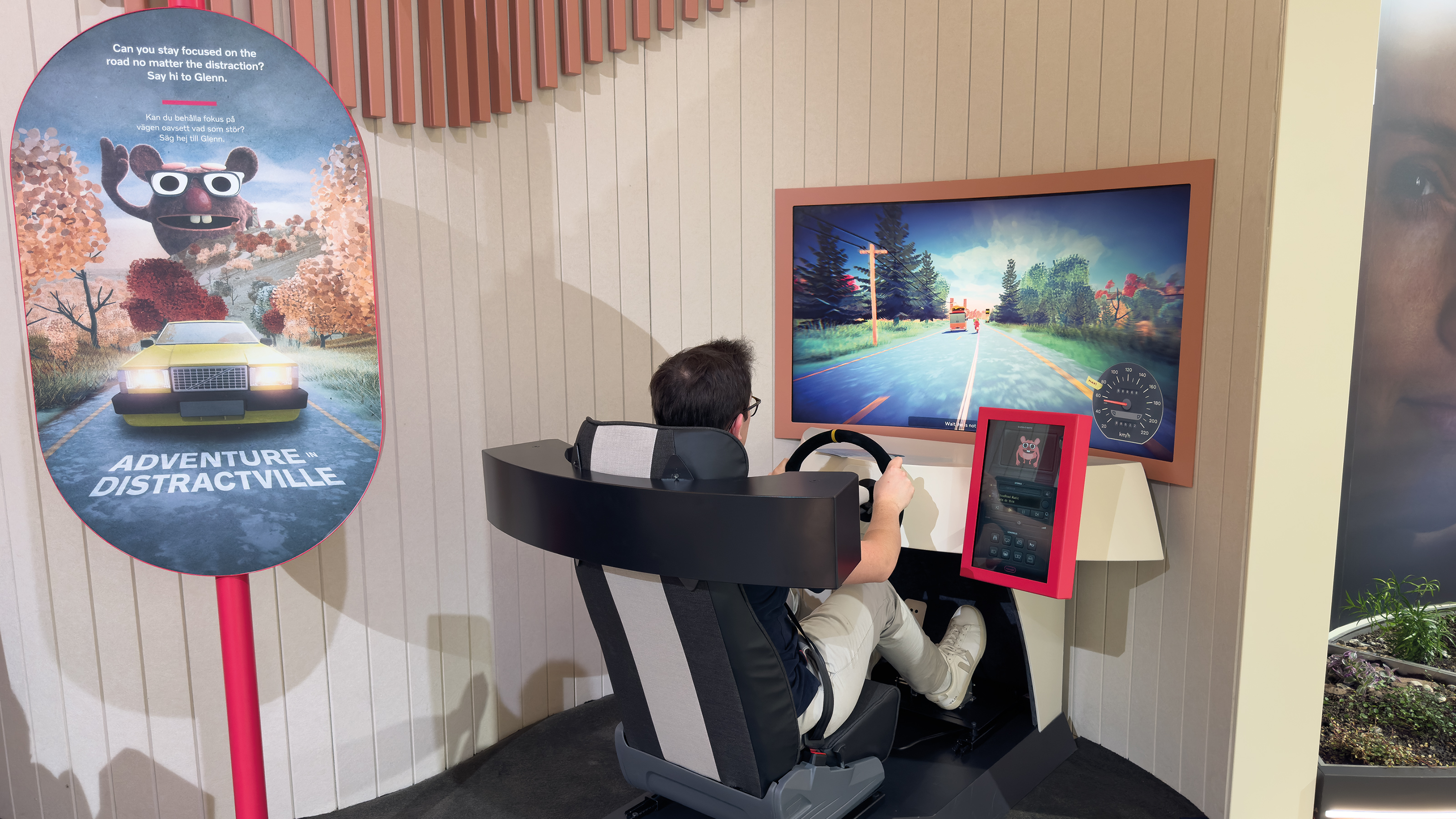 Auto Express consumer reporter Tom Jervis using a Volvo driving simulator