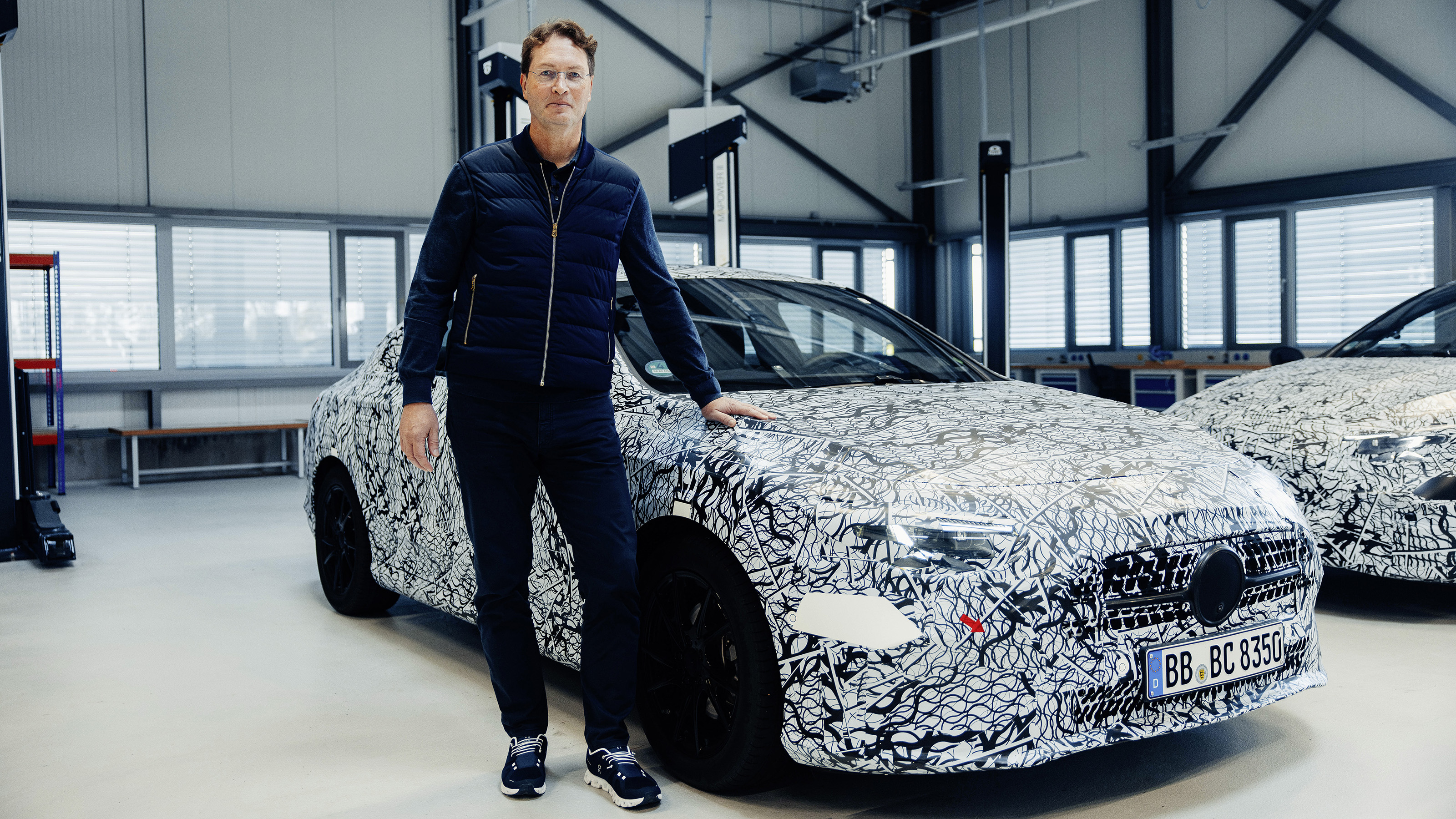 New Mercedes CLA - front with Mercedes CEO stood next to the car 