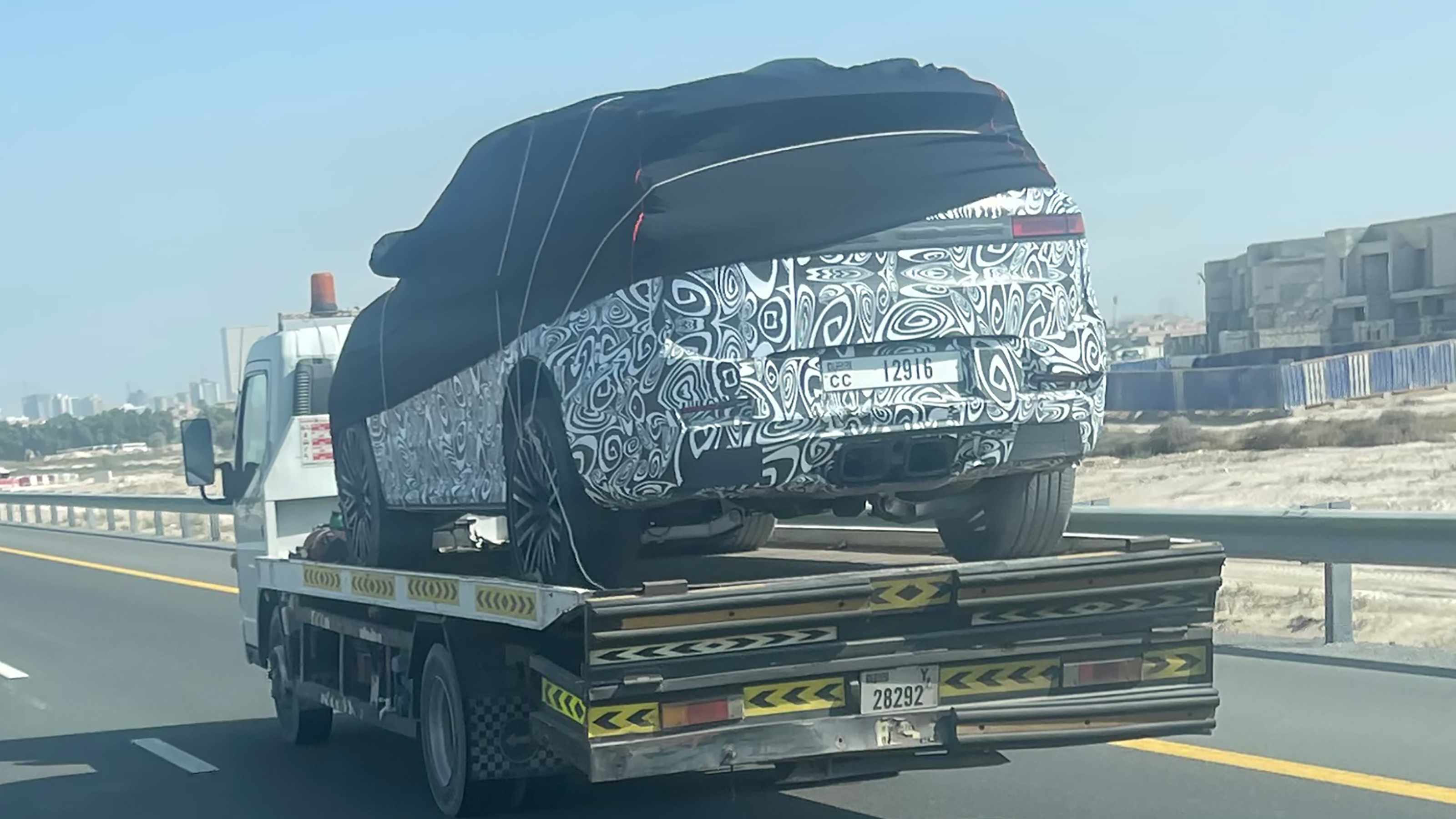 Range Rover spy shot - rear 3/4 on transporter