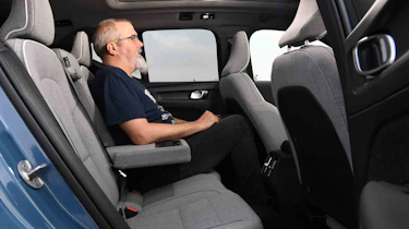 Volvo EX40 - rear seats with Senior test editor, Dean Gibson