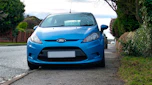 Ford Fiesta parked on pavement