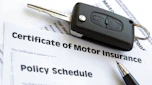 Car insurance documents and car key