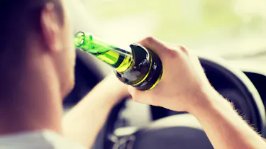 Person drinking while driving