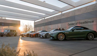 Exclusive Mercedes Manufaktur - cars parked outside on display