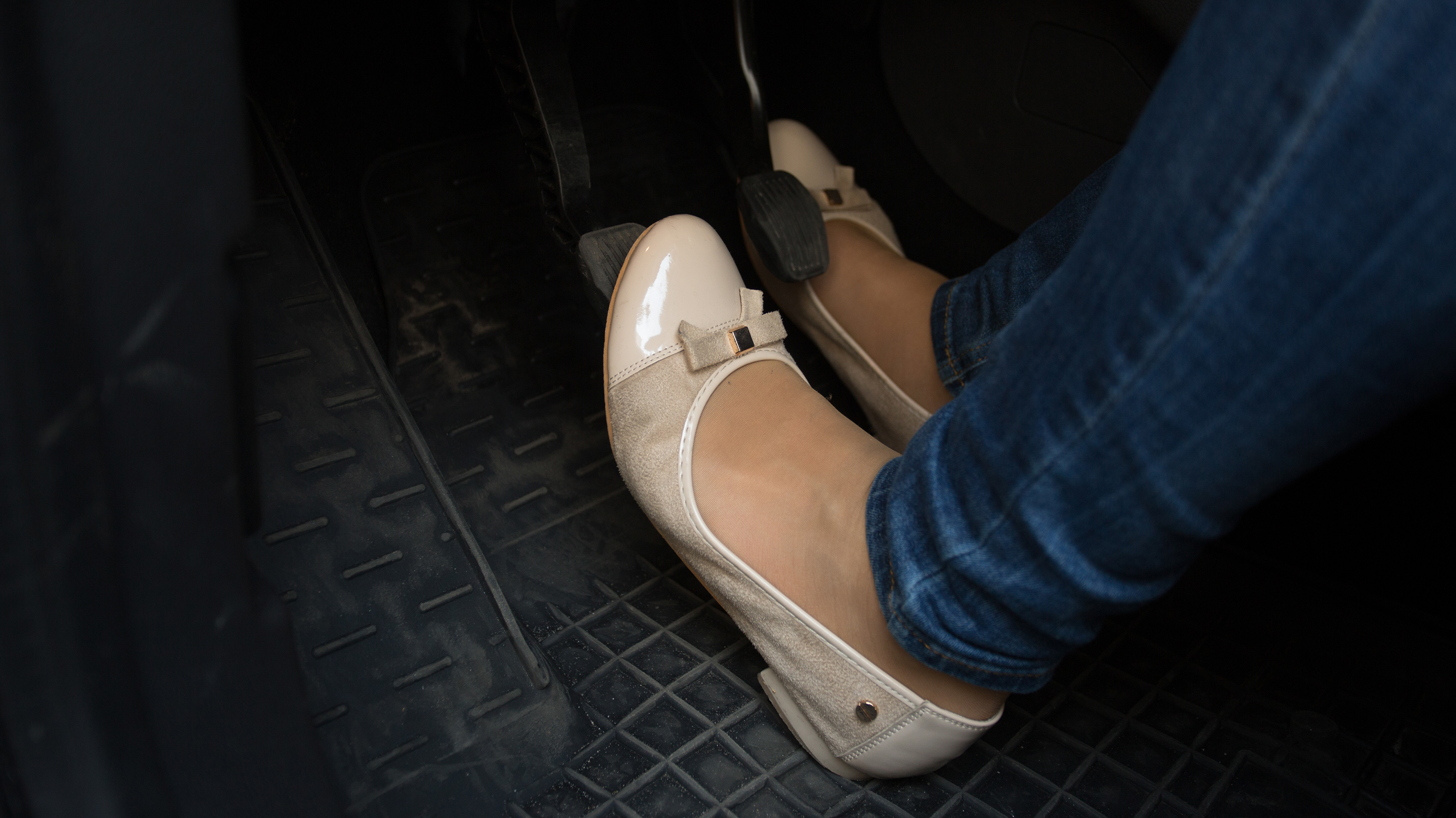 Driver's feet on pedals