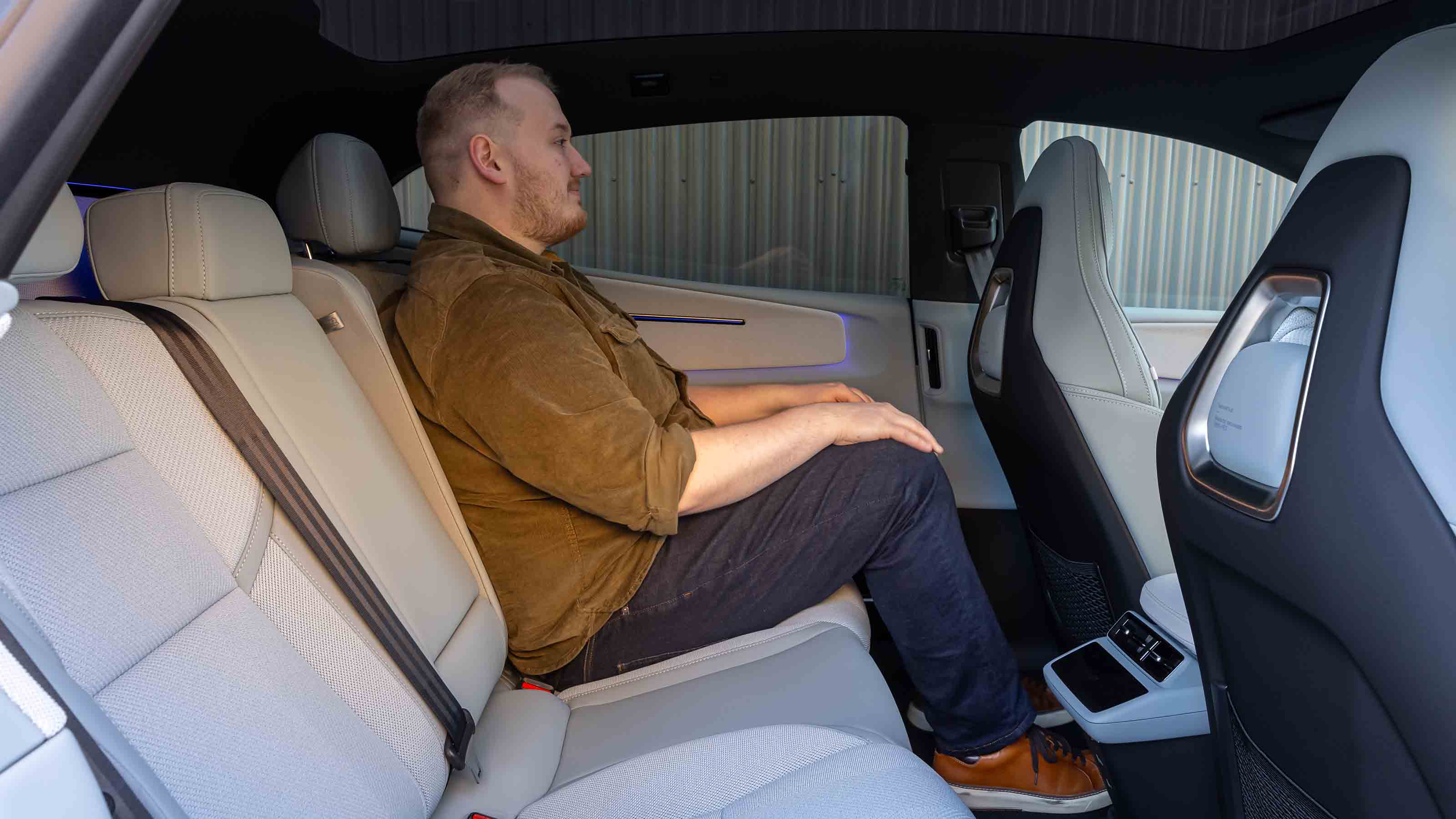 Polestar 4 Coupe - News reporter Ellis Hyde sitting in the rear seats