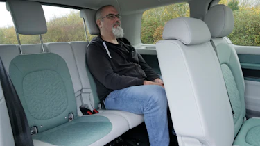 Auto Express senior road test editor Dean Gibson sitting in the Volkswagen ID. Buzz LWB's back seat