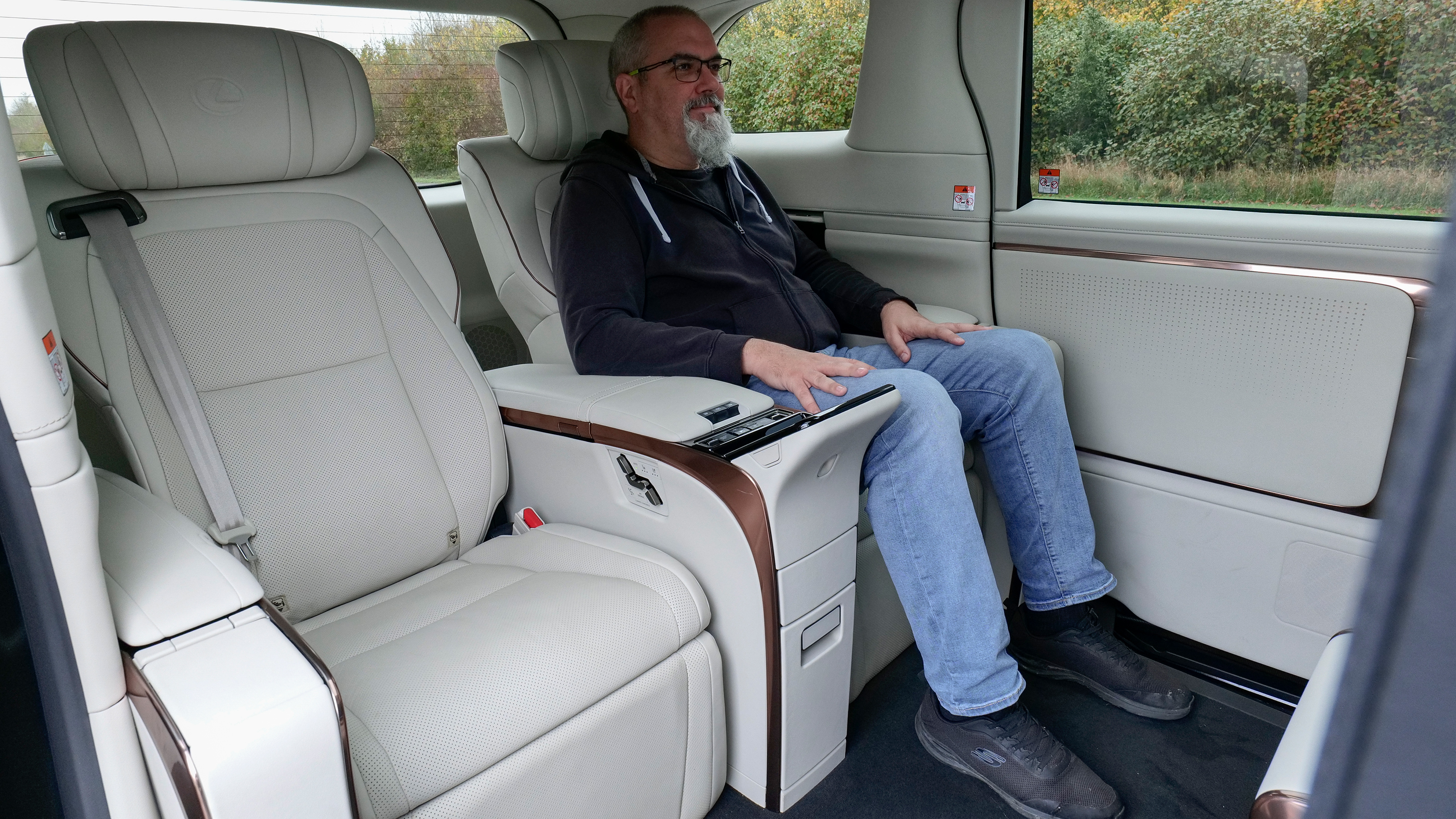 Auto Express senior road test editor Dean Gibson sitting in the Lexus LM's rear seat