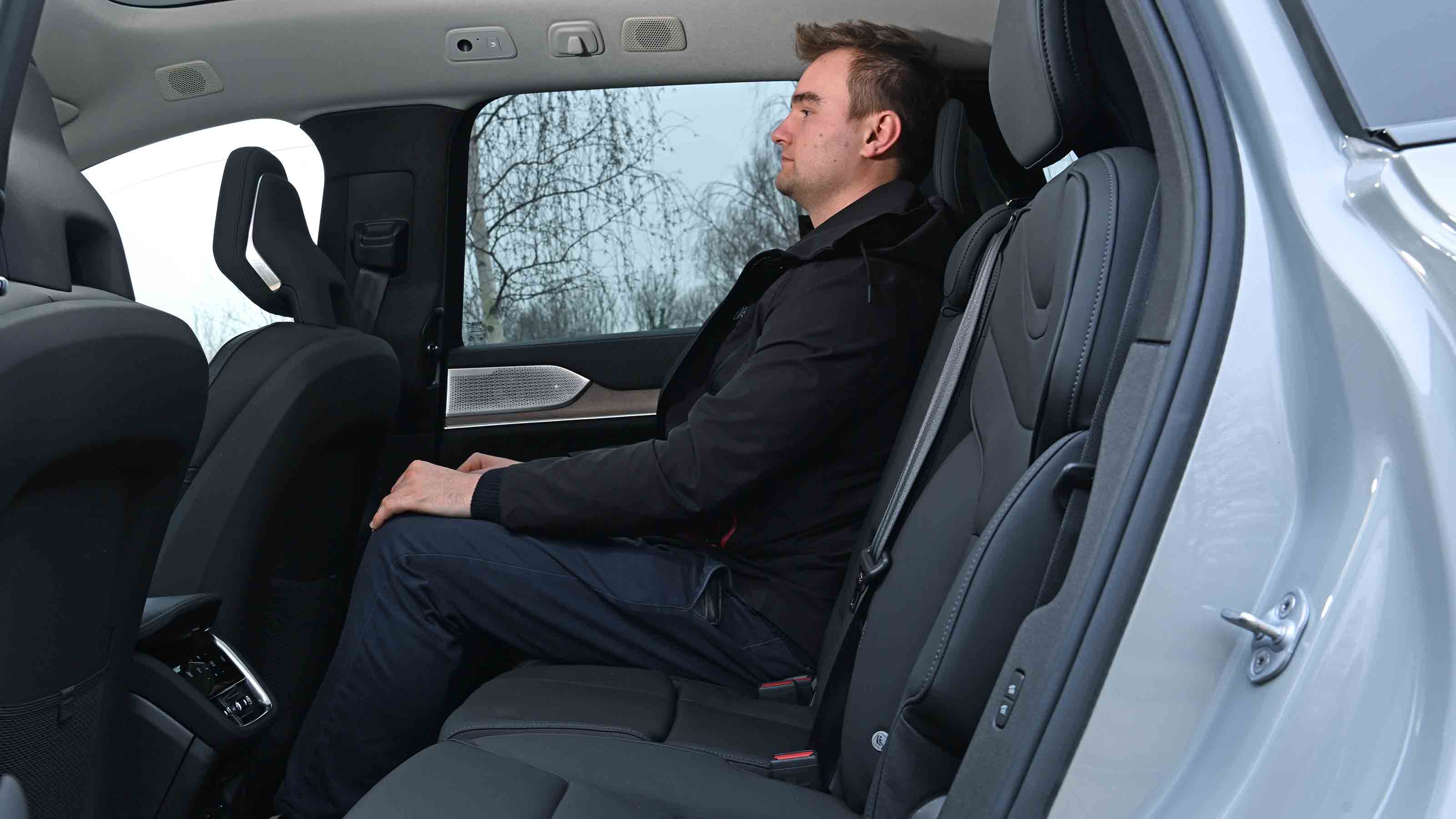Volvo EX90 - rear seats with Senior news reporter, Alastair Crooks
