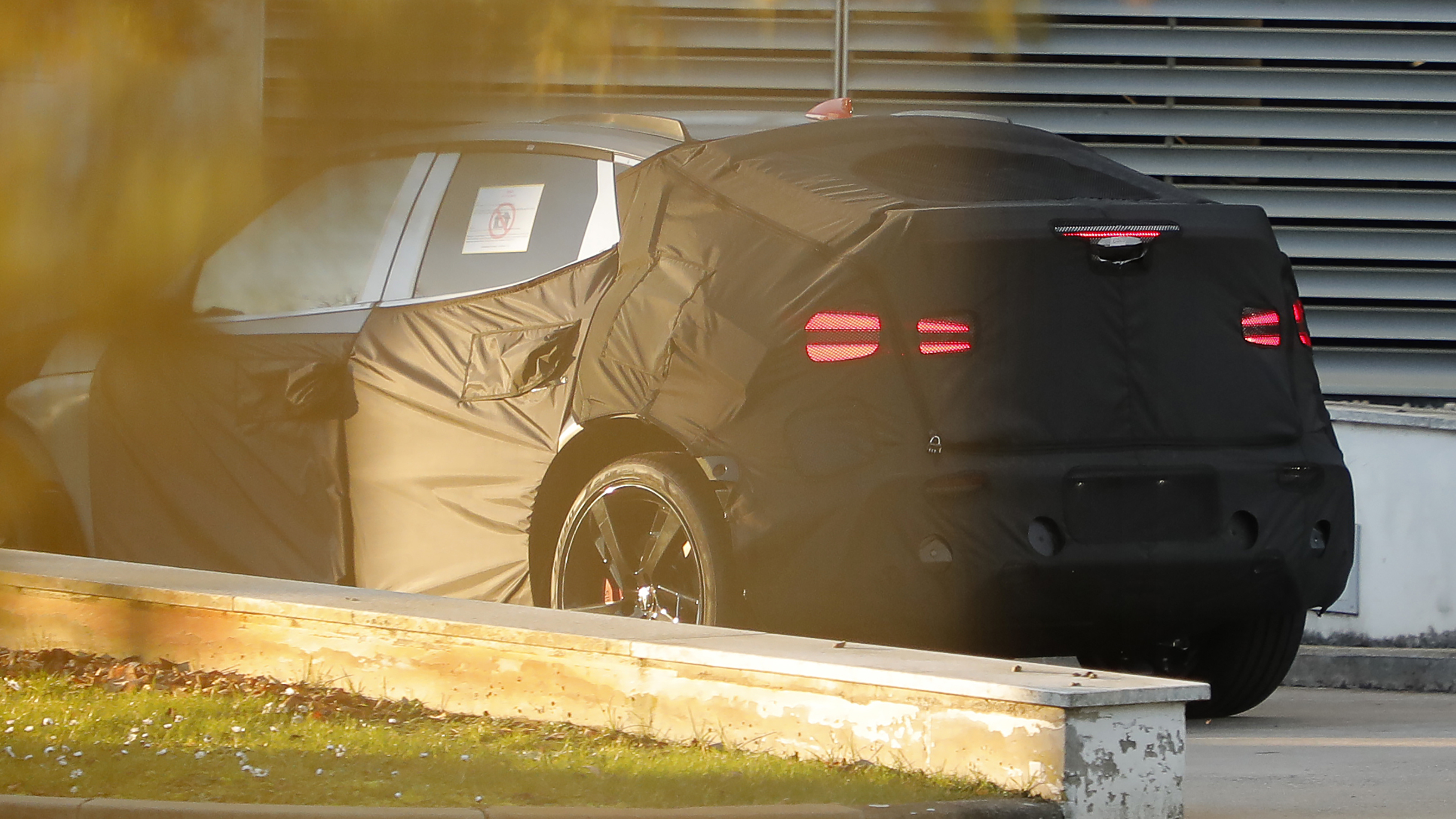 Genesis GV60 Magma spy shot - rear 3/4