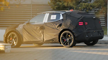 Genesis GV60 Magma spy shot - rear angled
