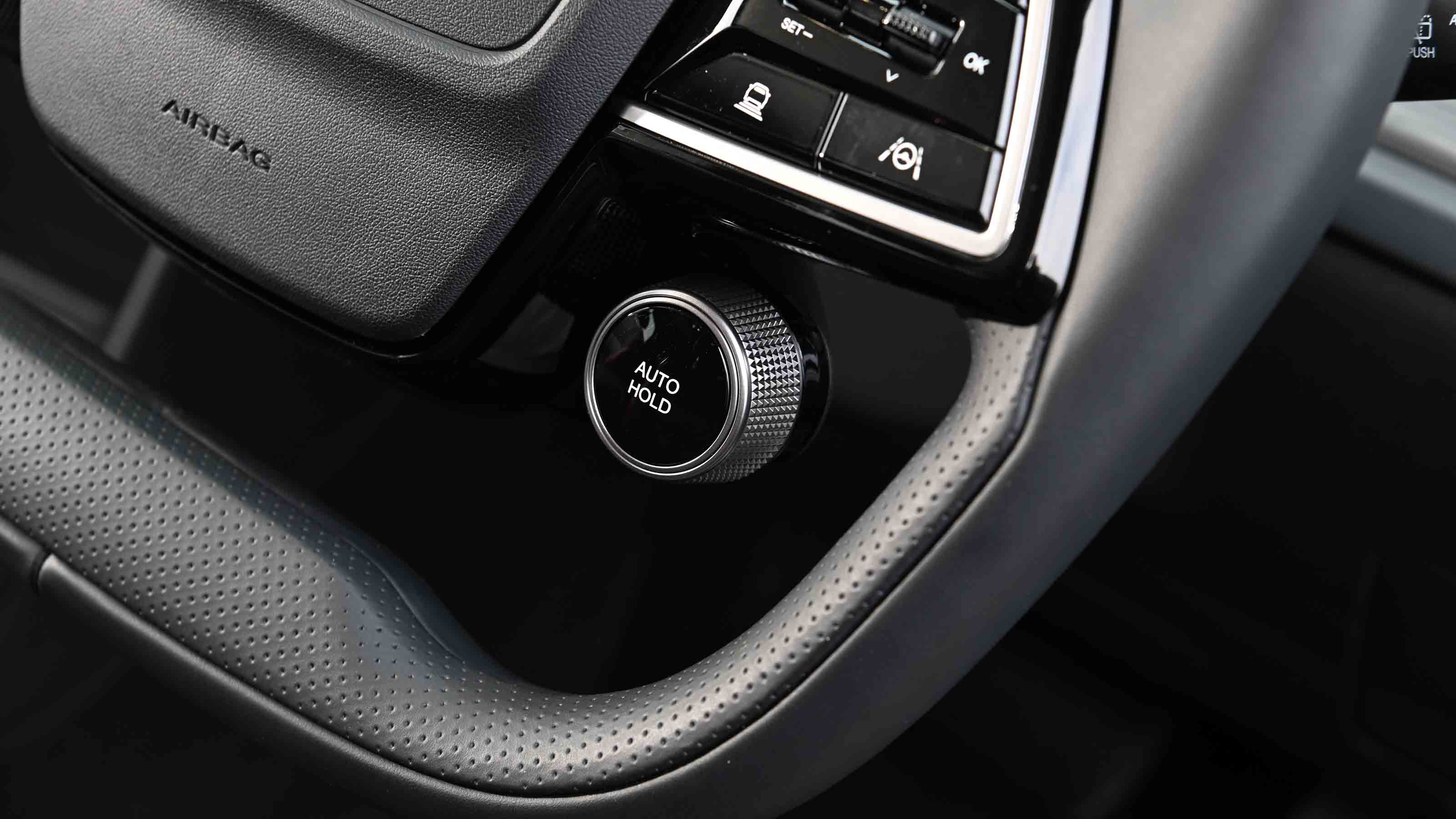KGM Actyon - auto hold button