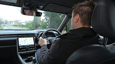 Auto Express senior news reporter Alastair Crooks driving the Lexus LBX