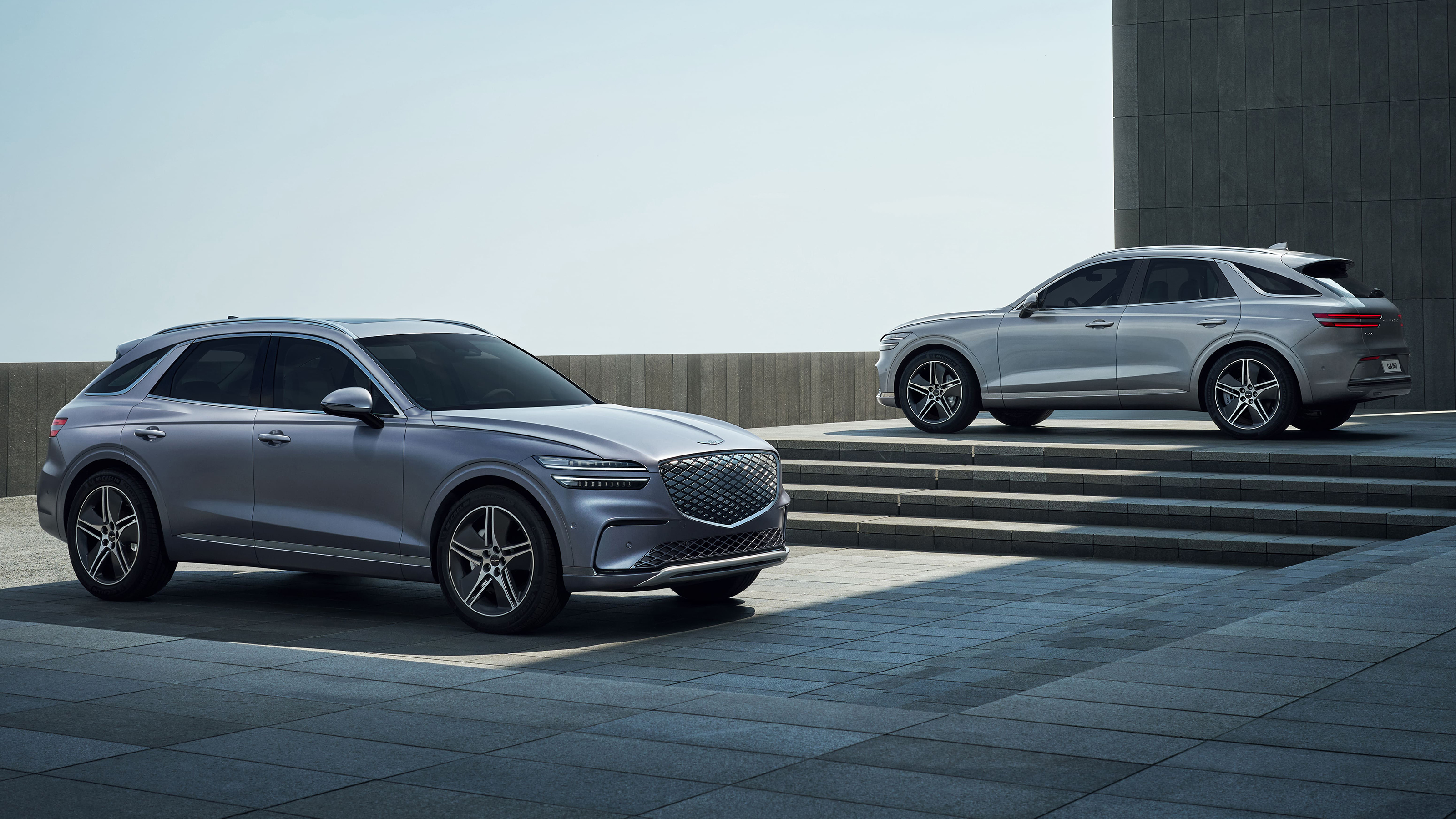 New 2025 Genesis Electrified GV70 - front and rear 3/4