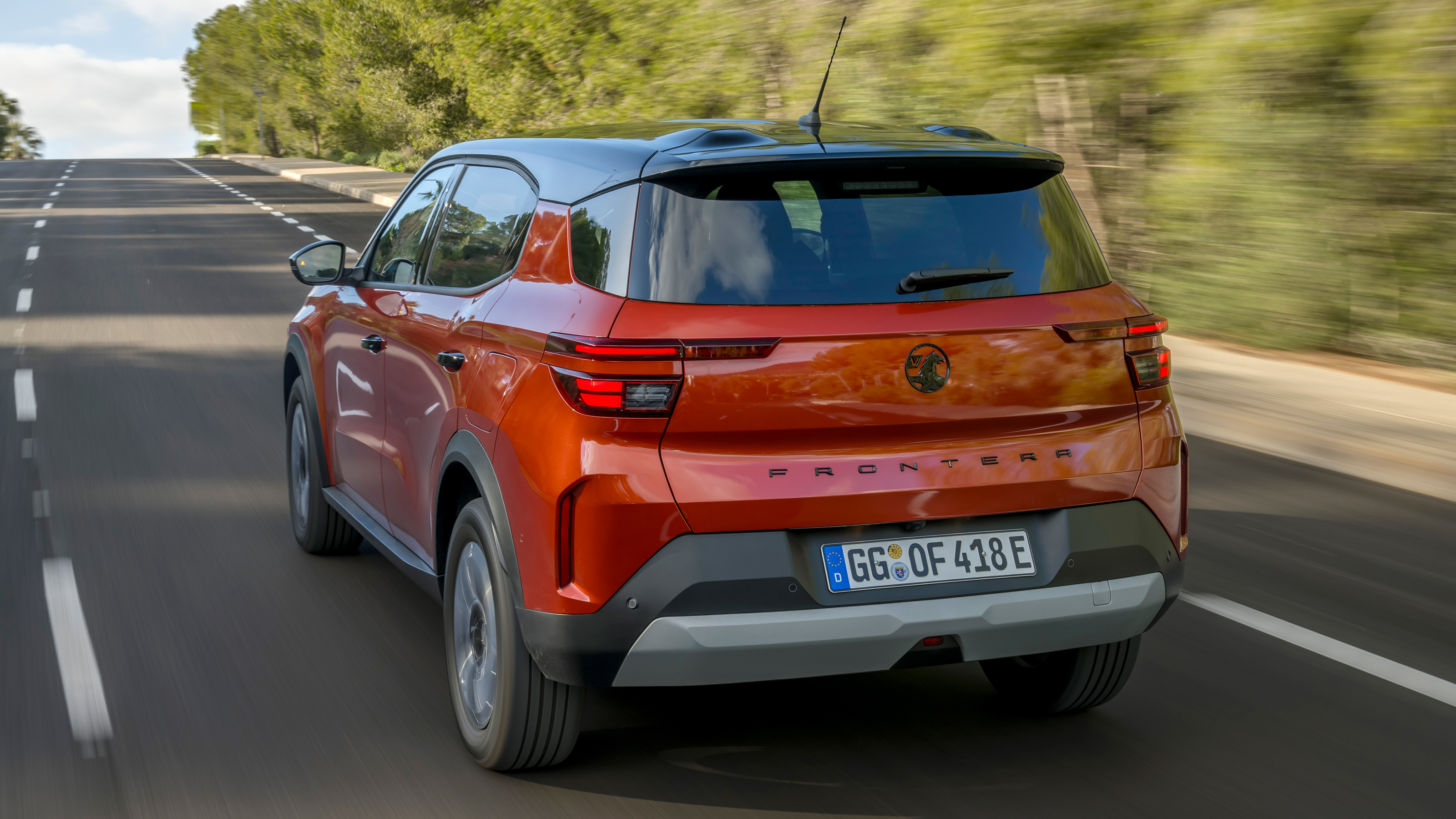 Vauxhall Frontera Electric GS Canton Orange - dynamic rear 3/4