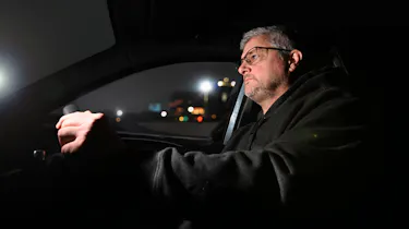 Auto Express consumer editor Chris Rosamond driving at night