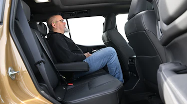 Auto Express senior test editor Dean Gibson sitting in the Toyota Land Cruiser's back seat