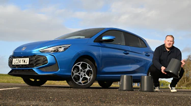 MG3 Hybrid+ long-term test - front 3/4 with Ellis playing three-card monty