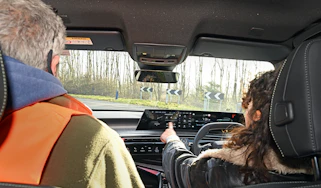 Auto Express UX web developer Victoria Coquet driving the Peugeot E-3008