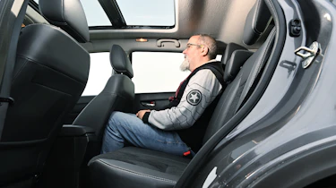 Auto Express senior road test editor Dean Gibson sitting in the Suzuki Vitara's back seat