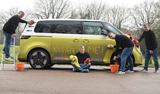 Auto Express editor Paul Barker cleaning the Volkswagen ID. Buzz