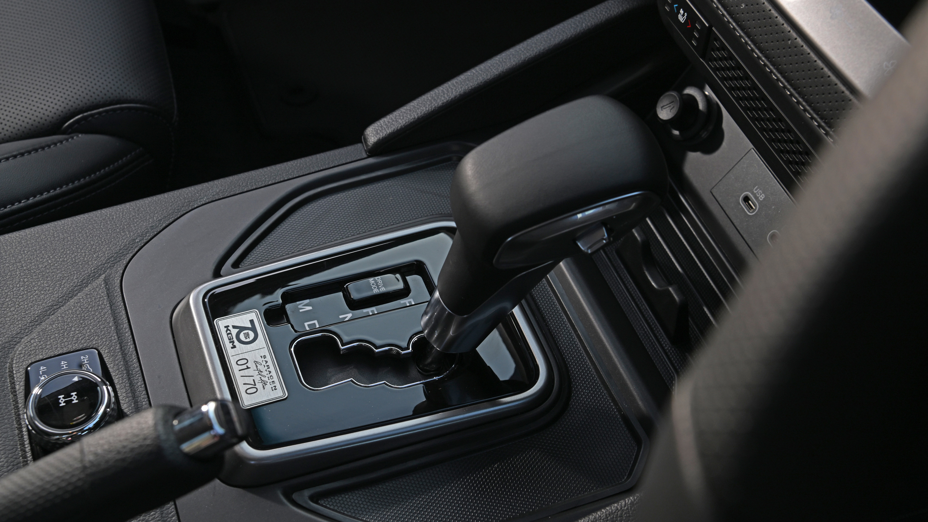 2025 KGM Musso - centre console and gear stick